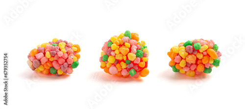 Sweet and Tangy Candy with Small Candies on the Outside of a Chewy Center Isolated on a White Background photo