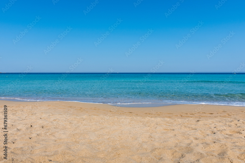 View of the sea in the Island with sandy beach, cloudless and clear water. Tropical colours, peace and tranquillity. Turquoise sea. Falasarna beach, Crete island, Greece. View of the sea in the Island with sandy beach, cloudless and clear water. Tropical colours, peace and tranquillity. Turquoise sea. Falasarna beach, Crete island, Greece.