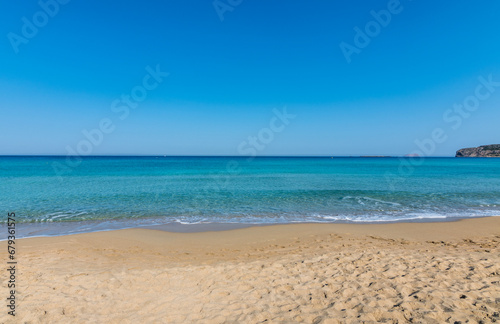 Fototapeta Naklejka Na Ścianę i Meble -  View of the sea in the Island with sandy beach, cloudless and clear water. Tropical colours, peace and tranquillity. Turquoise sea. Falasarna beach, Crete island, Greece.