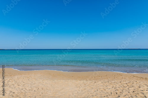 View of the sea in the Island with sandy beach, cloudless and clear water. Tropical colours, peace and tranquillity. Turquoise sea. Falasarna beach, Crete island, Greece.