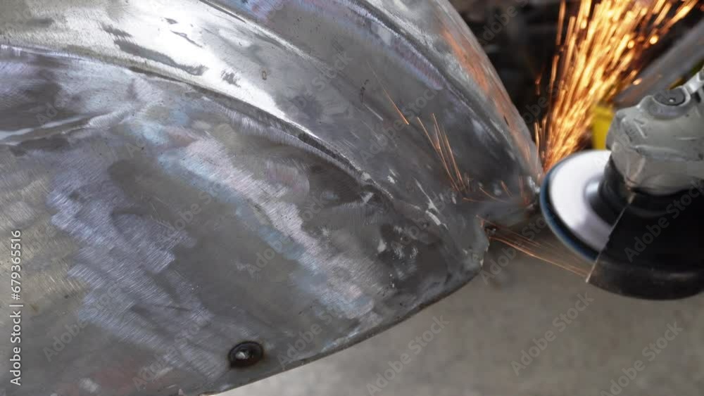 Motorcycle restoration
Restoration and repair of a retro scooter. Motorcycle without paint. The master prepares a motorcycle for priming. Cleaning welds with a grinder. Motorcycle restoration
Restoration and repair of a retro scooter. Motorcycle without paint. The master prepares a motorcycle for priming. Cleaning welds with a grinder.