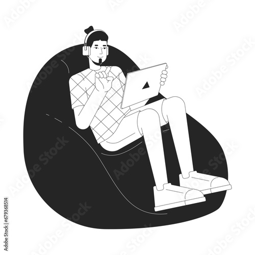 Beanbag guy holding tablet black and white 2D line cartoon character. Headphones young adult man isolated vector outline person. Movies watching, playing on tablet monochromatic flat spot illustration