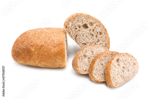 Freshly baked craft bread with cereals. Whole loaf and sliced. 