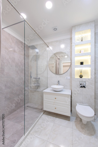 Modern Bathroom Interior. Bathroom Sink  Decoration and Mirror. Shower Glass. Luxury Home