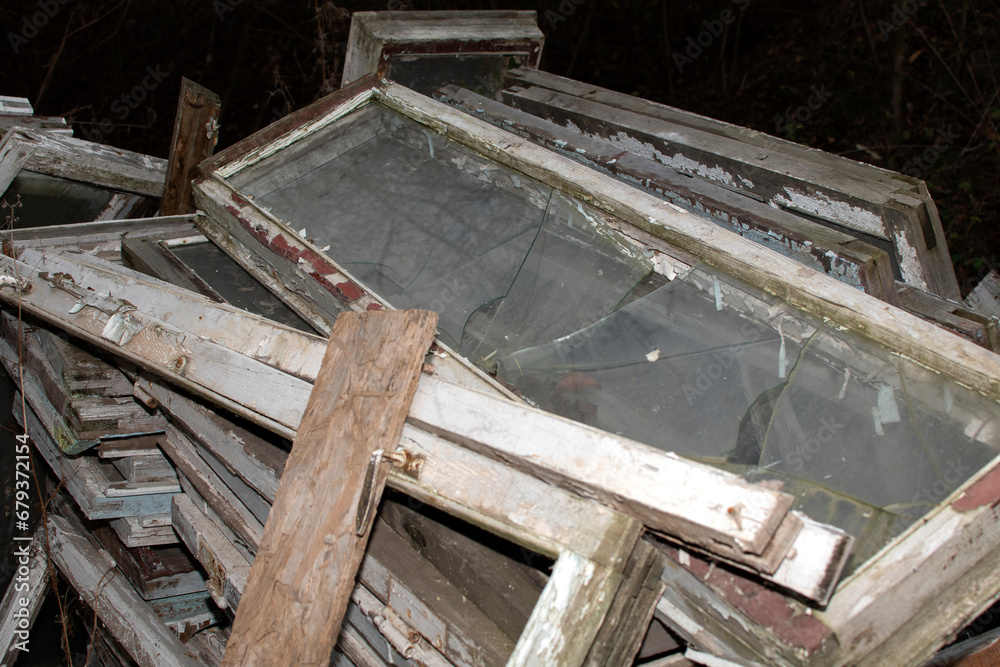 Pile of a old broken used windows Pile of a old broken used windows