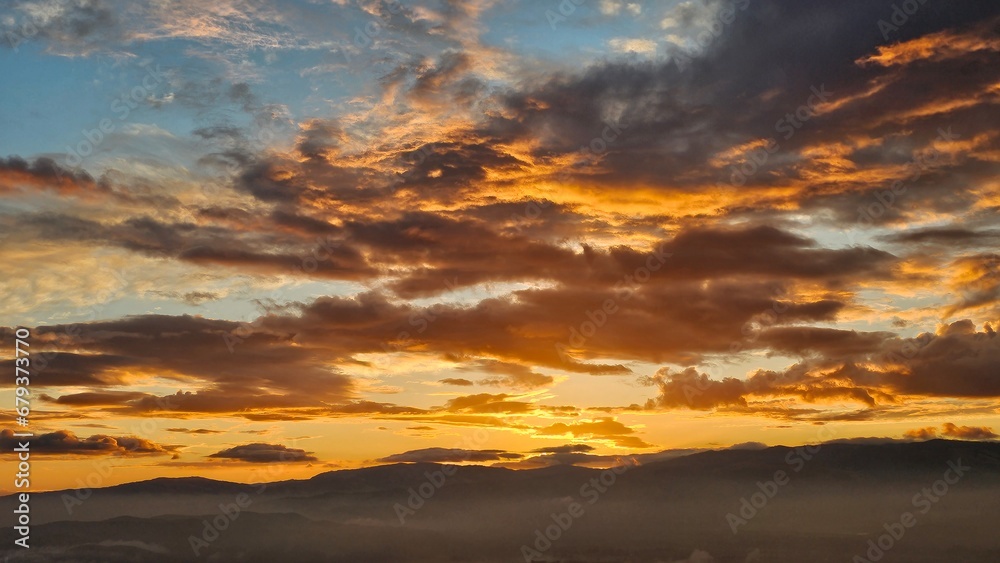 Fototapeta premium sunset over the mountains
