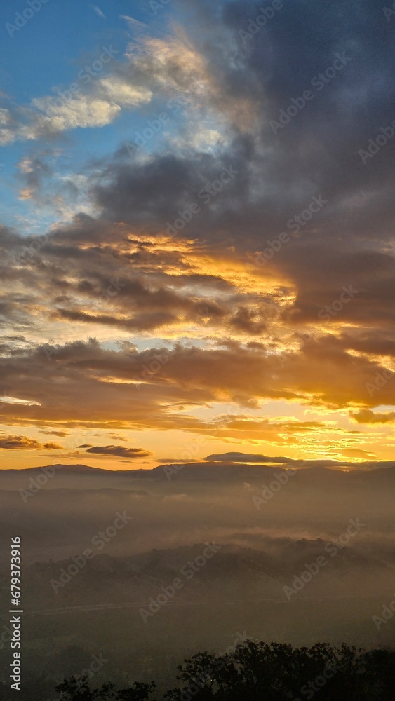 sunset over the mountains sunset over the mountains