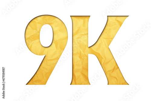 9K or 9000 written in isolated paper cutout effect revealing gold crumpled paper background photo