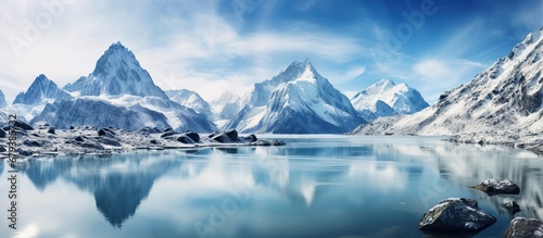 Beautiful winter mountain with deep lake landscape. AI generated image © orendesain99