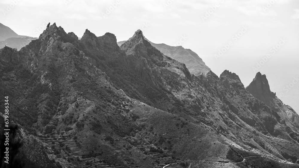 The Anaga massif (Macizo de Anaga). Natural landscape of the north of Tenerife. Canary Islands. Spain. View from the observation deck - Mirador Bailadero. Black and white.