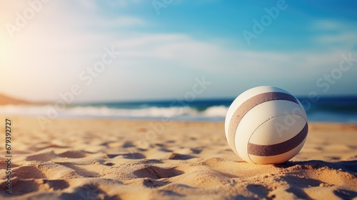 Volleyball ball on a sunny beach. Background for sporting events photo