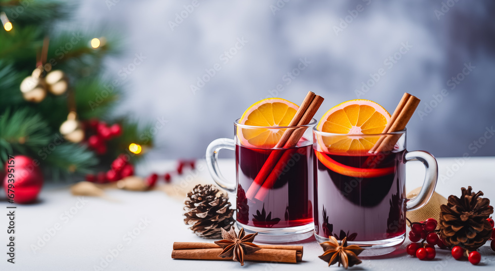 Christmas mulled red wine with spices and fruits. Traditional hot drink at Christmas time
Christmas mulled red wine with spices and fruits. Traditional hot drink at Christmas time