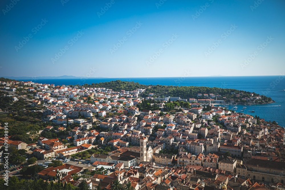 Aerial view of historic rooftops of a city situated by the tranquil waters in Dubrovnik