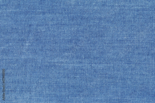a high resolution denim fabric textured background close-up photo