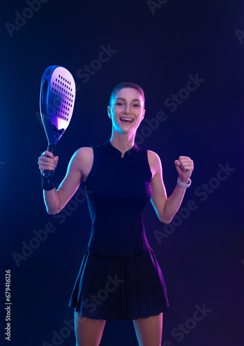 Padel tennis player in social media template. Girl athlete with paddle tenis racket on blue background. Social media ads mockup. Thumb up. © Mike Orlov