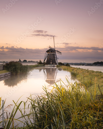 Reflection of the windmill in Stompwijk, The Netherlands. photo