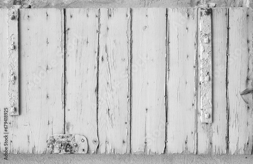 Black and white rough paint finish on white wood planks. Aged reclaimed barn wood. 
