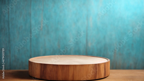 Product placement background with wooden plate table top and rustic blue wall. With copy space. 