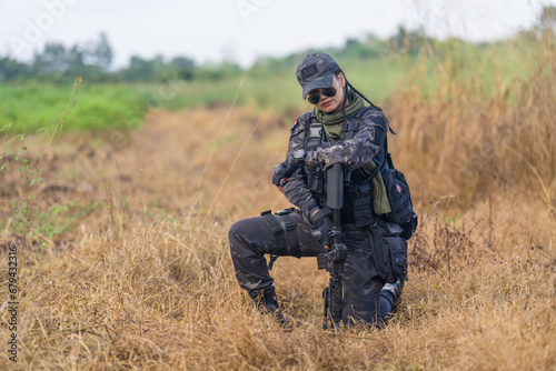 Thai female soldier in field training