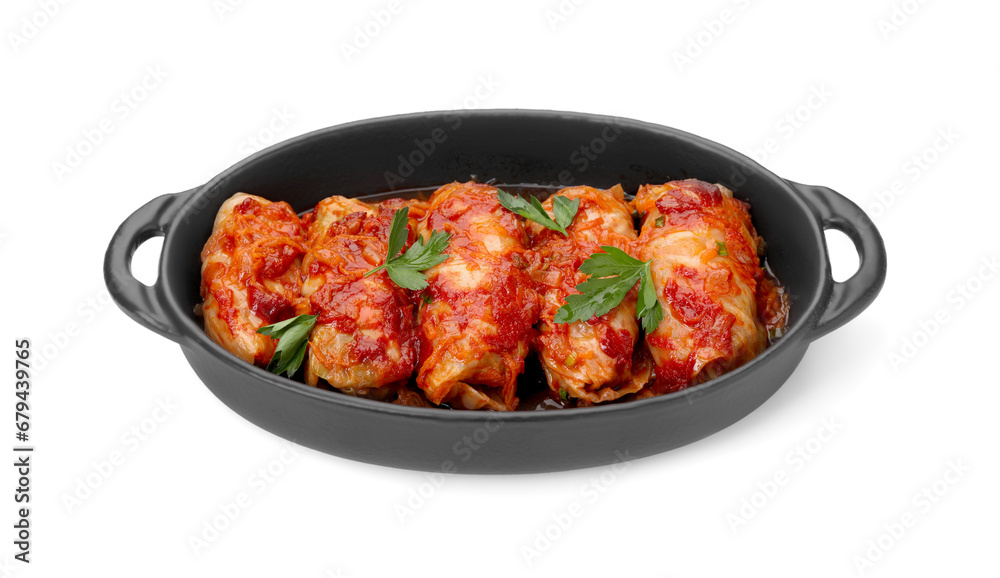 Baking dish of delicious stuffed cabbage rolls cooked with homemade tomato sauce isolated on white Baking dish of delicious stuffed cabbage rolls cooked with homemade tomato sauce isolated on white