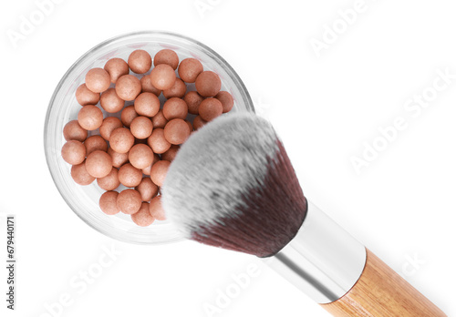 Face powder balls and brush isolated on white, top view