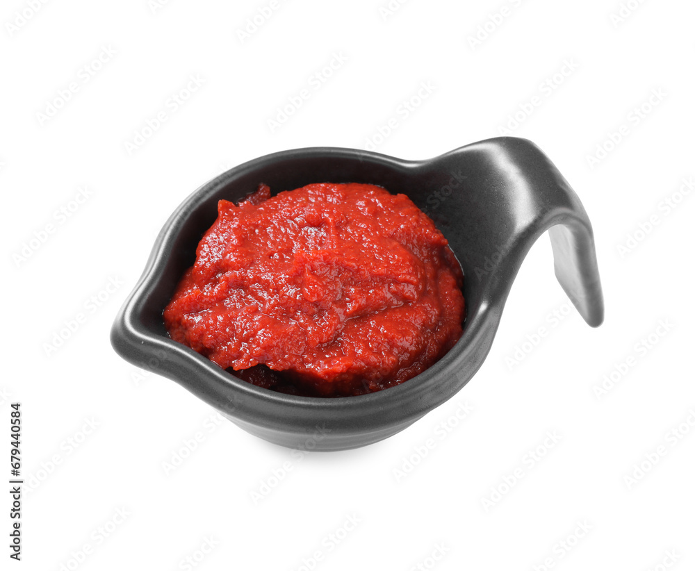Gravy boat with tasty tomato paste isolated on white Gravy boat with tasty tomato paste isolated on white