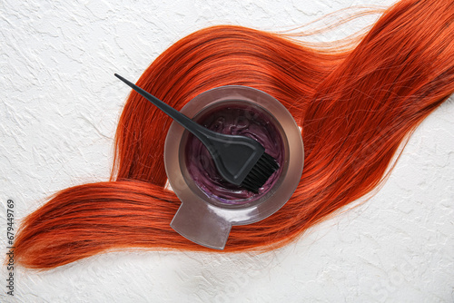 Bowl with hair dye, brush a...