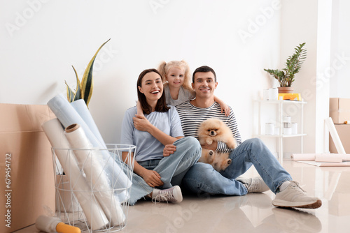Happy family hugging during...