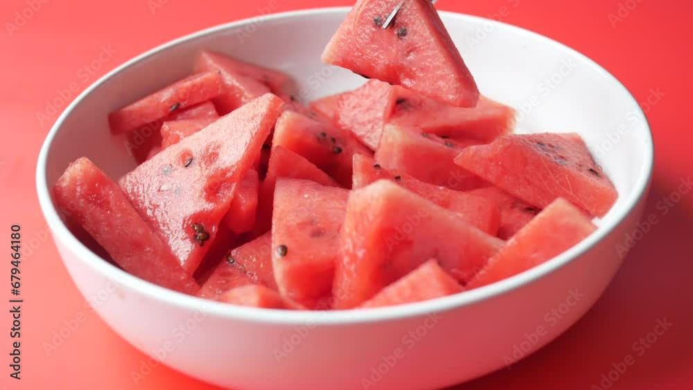 fork pick slice of water melon fork pick slice of water melon