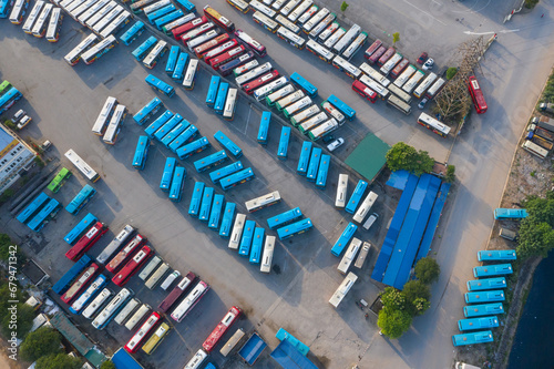 Fototapeta Naklejka Na Ścianę i Meble -  Aerial view of city buses in the parking lot at the bus station