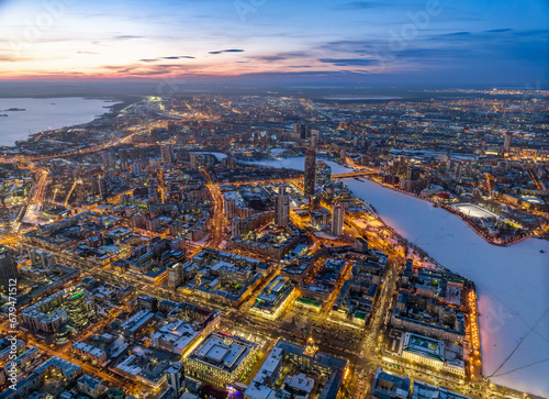 Embankment of the central pond and Plotinka in Yekaterinburg at winter sunset. The historic center of the city of Yekaterinburg, Russia, Aerial View © Dmitrii Potashkin