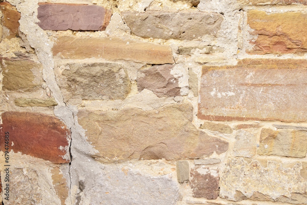 Background from part of a wall made of natural stone Background from part of a wall made of natural stone
