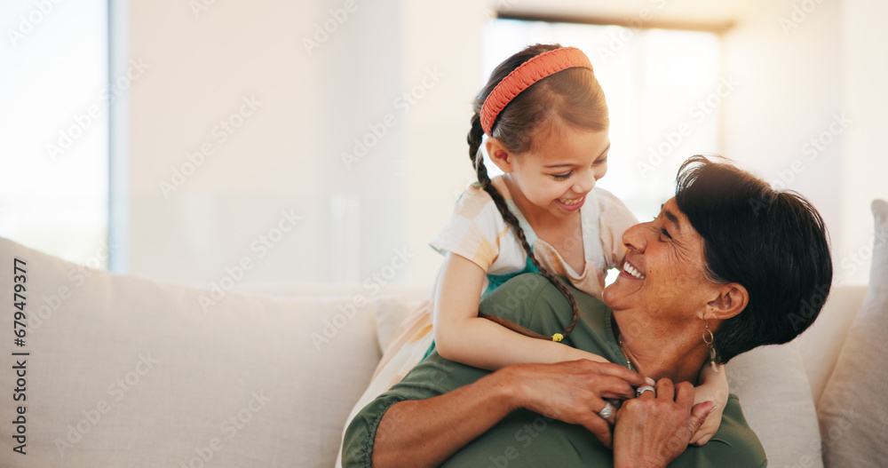 Home, relax and hug with grandmother, girl and happiness with weekend break, embrace and bonding together. Old woman, senior person and child with joy, conversation or support with love, care and kid - obrazy, fototapety, plakaty 