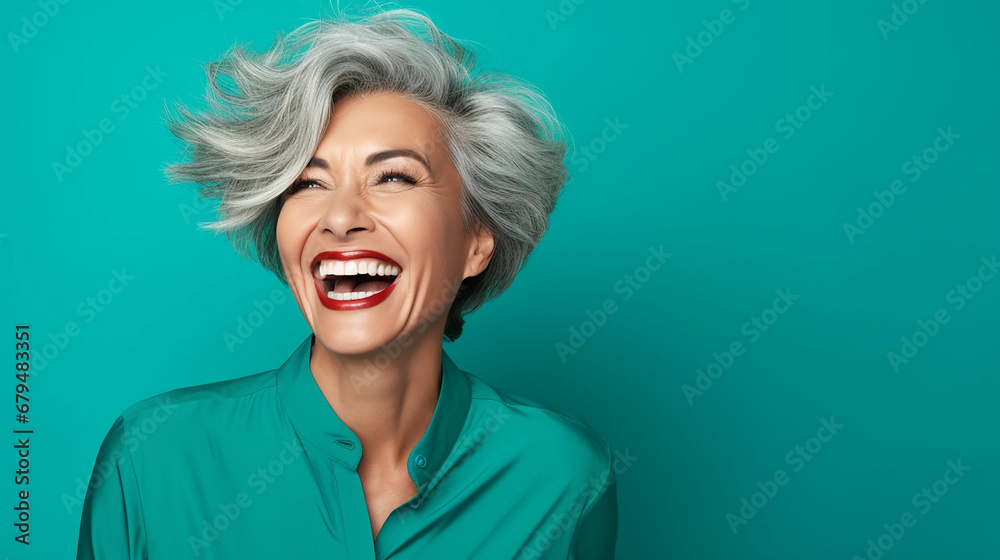 Portrait of attractive cheerful glad grey-haired woman laughing funny joke isolated over bright teal turquoise color background. Made with generative ai Portrait of attractive cheerful glad grey-haired woman laughing funny joke isolated over bright teal turquoise color background. Made with generative ai