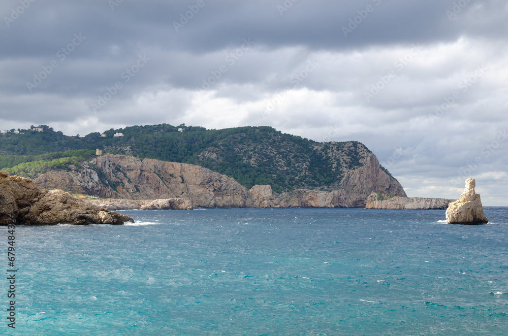 Beautiful sights in Ibiza Spain of the rugged coast, Mediterranean sea and charming architecture 