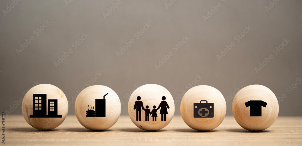 Human or family desire four requisites in life. Wood Icon food, clothing, house and medicine place on the table. four basic human needs concept. - obrazy, fototapety, plakaty 
