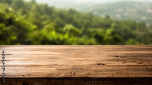 Empty wooden table for product placement or montage with nature background.
