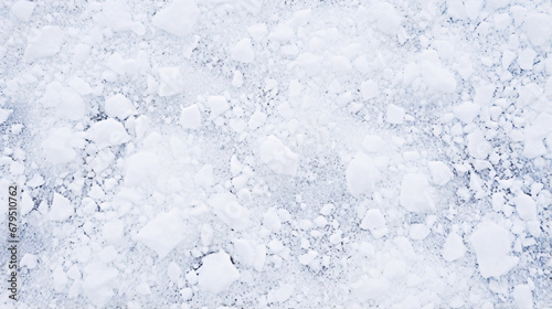氷の地面を俯瞰したテクスチャー、冬の背景素材