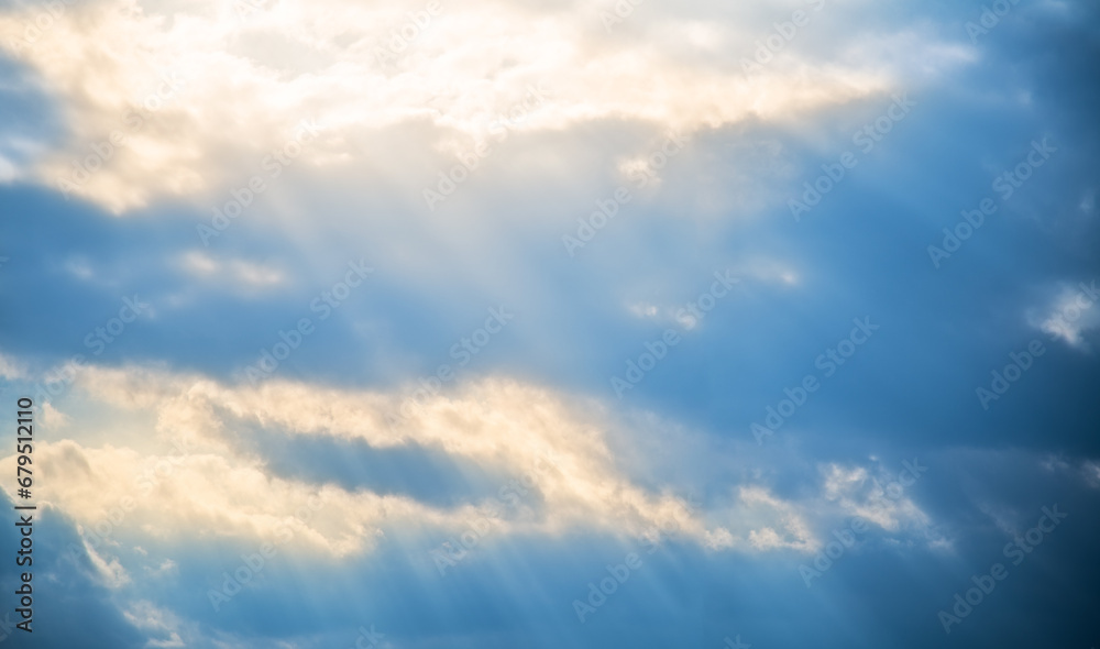 Background of sunlight through clouds