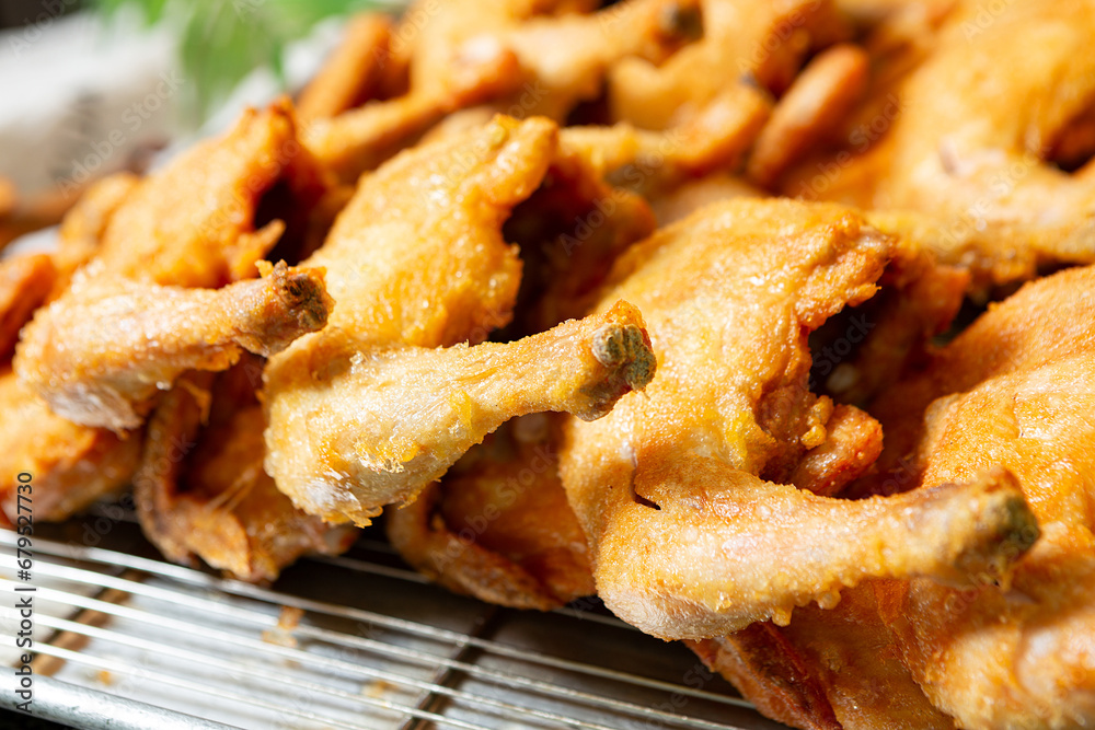 Fried chicken on grill plate Fried chicken on grill plate