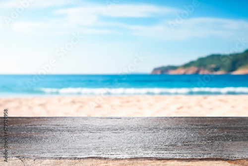 Top of wood table with seascape  blur calm sea and sky at tropic