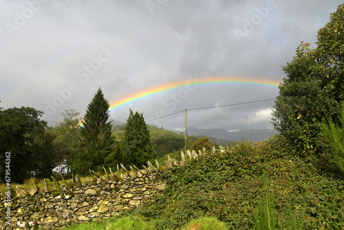 A rainbow shining above the valley of Little Langdale, near Skelwith Bridge in the Lake District