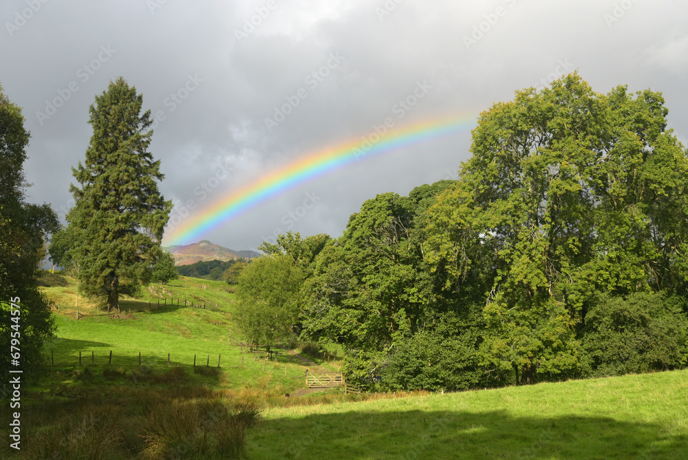 A rainbow shining above the valley of Little Langdale, near Skelwith Bridge in the Lake District