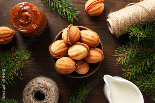 Cookies Nuts in a bowl with a sprig of needles