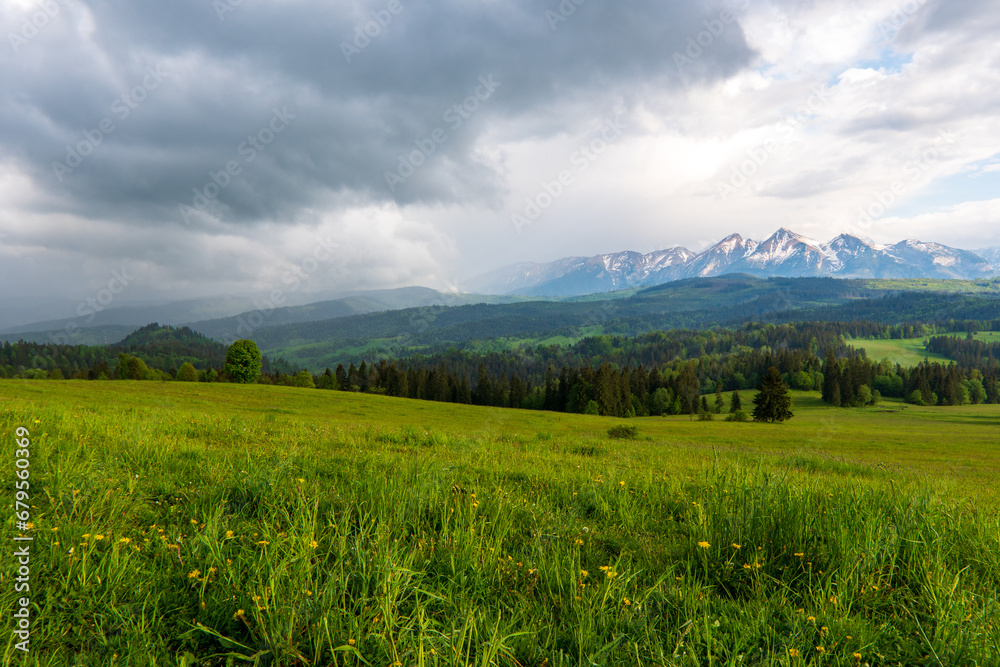 Dark clouds and rain storm over the rice field, rainy season in Tatras mountain poland