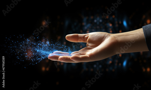 Close up of human hand touching with finger screen with blue glowing particles. © Vitalii