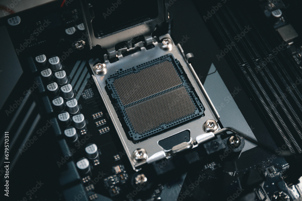 Computer processor from 2023 - CPU sitting in a motherboard on a gaming computer Computer processor from 2023 - CPU sitting in a motherboard on a gaming computer