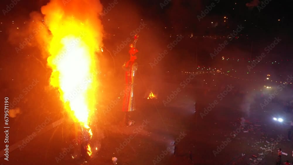 A drone shot of a Ravana's idol being burned at the dussehra festival in India
