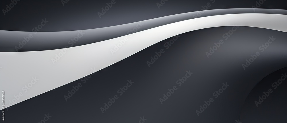 Abstract monochrome image showing a smooth, curved sculpture with a gradient from dark to light Abstract monochrome image showing a smooth, curved sculpture with a gradient from dark to light