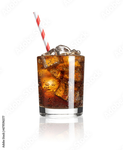 Soda and straw in glass with ice cubes on white isolated